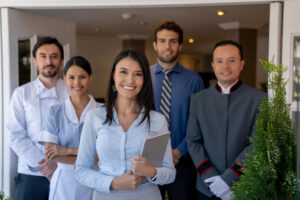 a few hospitality workers standing in a group