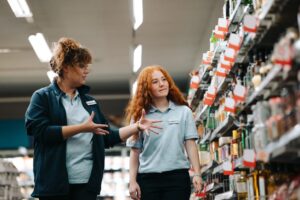 woman at new retail job orientation with a female supervisor