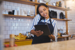 woman employee taking a food order over the phone