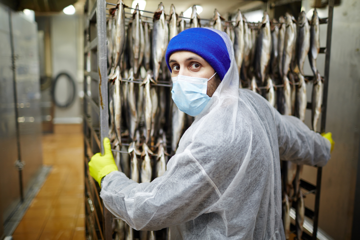 worker-of-seafood-plant-2021-09-24-03-24-28-utc