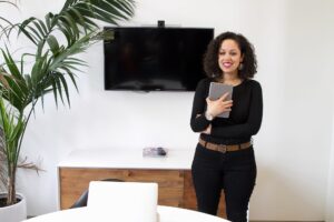 women giving a presentation in a conference room