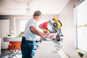 handyman working on a home improvement project on a construction site